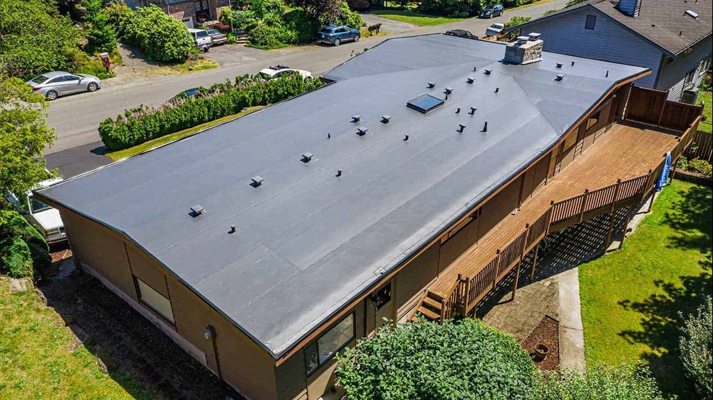 Top View of Modern Roof of House with Flat PVC Roofing - Seattle, WA - Valentine Roofing