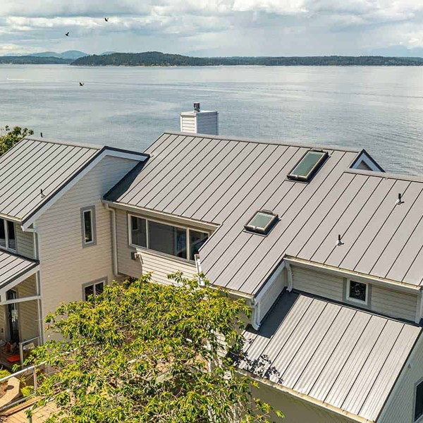 Metal standing seam panel roof installation in Seattle, Washington