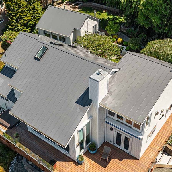 Gray metal roof installation project in Seattle, Washington