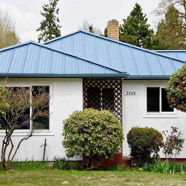 Blue Standing Seam Metal Panel Roof Installation in Tukwila, Washington