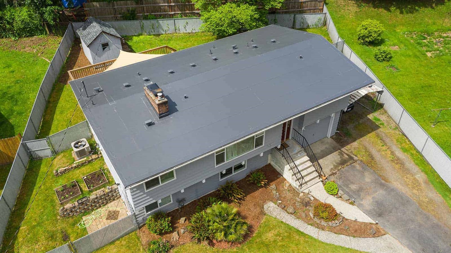 A dark gray PVC single ply roof installed in Seattle, WA 