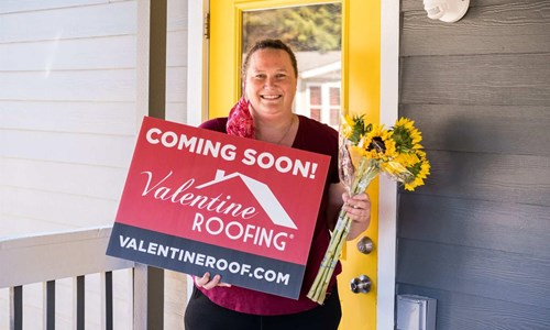 Meet Gabby gabby holding a Valentine Roof coming soon sign